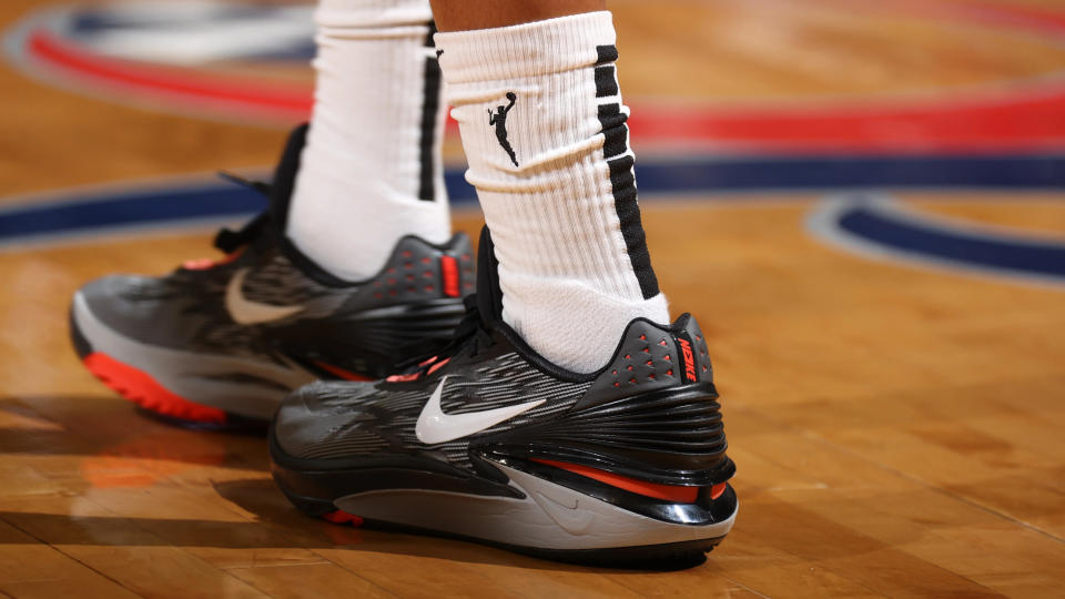 The sneakers worn by Brittney Sykes #15 of the Washington Mystics during the game against the <a class="link " href="https://sports.yahoo.com/wnba/teams/pho" data-i13n="sec:content-canvas;subsec:anchor_text;elm:context_link" data-ylk="slk:Phoenix Mercury;sec:content-canvas;subsec:anchor_text;elm:context_link;itc:0">Phoenix Mercury</a>