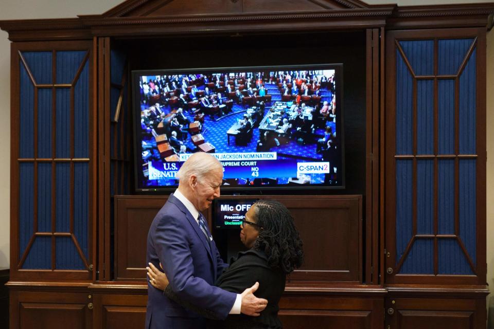 President Biden embraces Judge Ketanji Brown Jackson as they watch the Senate vote on her nomination to the Supreme Court from the Roosevelt Room of the White House on April 7. 