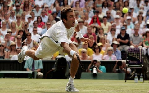 Gimelstob lunges for the ball at Wimbledon - Gimelstob during his playing years in 2005 - Credit: Getty Images