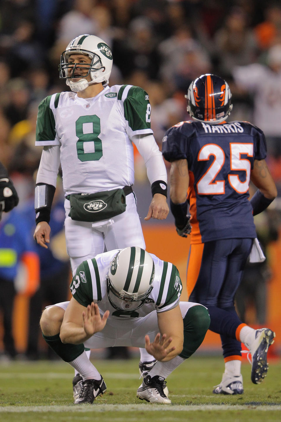 DENVER, CO - NOVEMBER 17: Nick Folk #2 and Mark Brunell #8 of the New York Jets react after Folk missed a 61-yard field goal attempt in the second quarter against the Denver Broncos at Invesco Field at Mile High on November 17, 2011 in Denver, Colorado. (Photo by Doug Pensinger/Getty Images)
