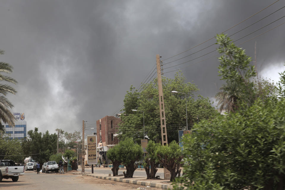 Smoke is seen rising from a neighborhood in Khartoum, Sudan, Saturday, April 15, 2023. Fierce clashes between Sudan's military and the country's powerful paramilitary erupted in the capital and elsewhere in the African nation after weeks of escalating tensions between the two forces. The fighting raised fears of a wider conflict in the chaos-stricken nation. (AP Photo/Marwan Ali)