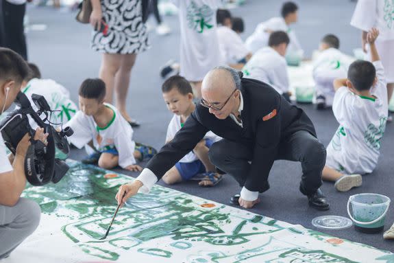 The artist with the kids.