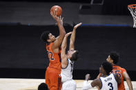 Virginia Tech's Keve Aluma shoots as Villanova's Collin Gillespie defends during the first half of an NCAA college basketball game Saturday, Nov. 28, 2020, in Uncasville, Conn. (AP Photo/Jessica Hill)