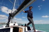 Barczi, member of a boat rental agency, walks on a sailing boat on Lake Balaton, following the outbreak of the coronavirus disease (COVID-19), near Balatonfured