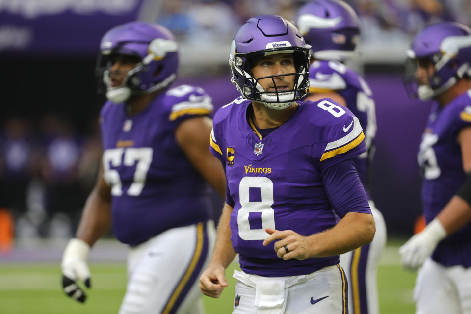 Minnesota Vikings quarterback Kirk Cousins (8) walks off the field after getting sacked during the second half of an NFL football game against the Los Angeles Chargers, Sunday, Sept. 24, 2023, in Minneapolis. (AP Photo/Bruce Kluckhohn)