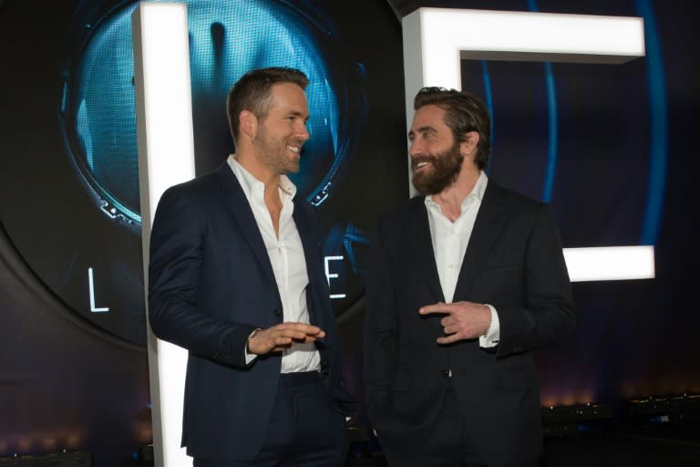 Actors Ryan Reynolds (L) and Jake Gyllenhaal attend the 'Life' premiere during 2017 SXSW Conference and Festivals, at the ZACH Theatre in Austin, Texas, on March 18, 2017