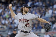 Houston Astros starting pitcher Gerrit Cole (45) delivers against the New York Yankees during the first inning of Game 3 of baseball's American League Championship Series, Tuesday, Oct. 15, 2019, in New York. (AP Photo/Frank Franklin II)