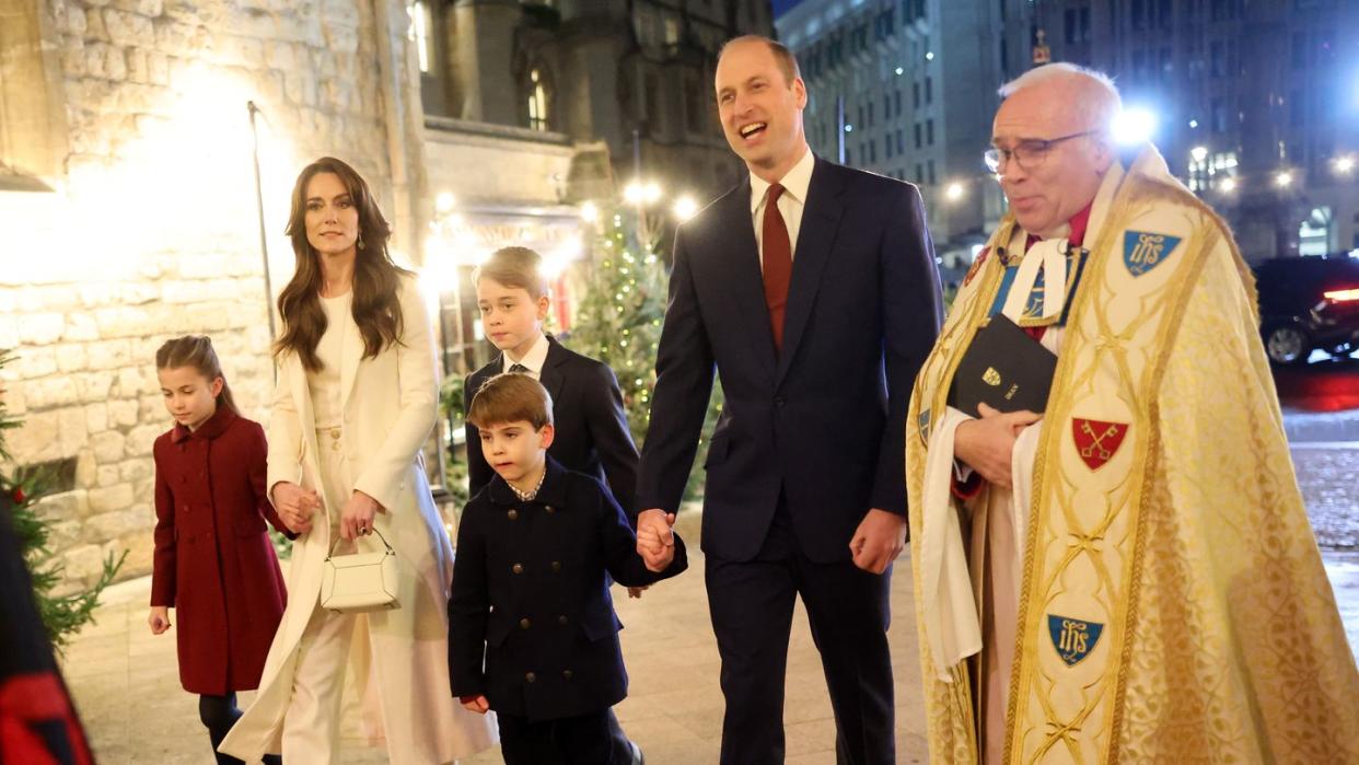 london, england december 08 princess charlotte of wales, catherine, princess of wales, prince louis of wales, prince george of wales, prince william, prince of wales and the dean of westminster abbey, the very reverend dr david hoyle attend the together at christmas carol service at westminster abbey on december 08, 2023 in london, england spearheaded by the princess of wales, and supported by the royal foundation, the service is a moment to bring people together at christmas time and recognise those who have gone above and beyond to help others throughout the year photo by chris jacksongetty images
