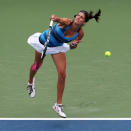 Julia Georges of Germany serves to Shahar Peer of Israel during day three of the Western & Southern Open at Lindner Family Tennis Center on August 13, 2012 in Mason, Ohio. (Photo by Nick Laham/Getty Images)