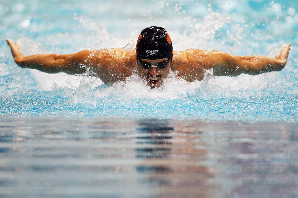 INDIANAPOLIS, IN - MARCH 29: Davis Tarwater swims in the men's 100 meter butterfly final during day one of the 2012 Indianapolis Grand Prix at the Indiana University Natatorium on March 29, 2012 in Indianapolis, Indiana. (Photo by Dilip Vishwanat/Getty Images)