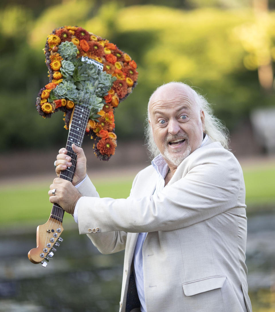 <p>Photo by: zz/KGC-107/STAR MAX/IPx 2021 9/7/21 Actor, comedian and musician Bill Bailey poses with a guitar adorned with seasonal British-grown flowers as he opens the 28th Edition of the Royal Horticultural Society (RHS) Garden Wisley Flower Show on September 7, 2021 in Woking, Surrey, England, UK.</p>
