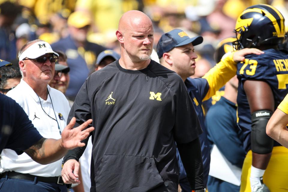 Michigan associate head coach and director of strength and conditioning Ben Herbert watches a play during the second half of U-M's 30-3 win on Saturday, Sept. 2, 2023, at Michigan Stadium.