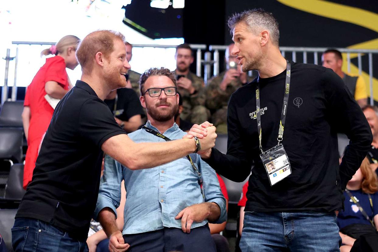 <p>Chris Jackson/Getty Images</p> (From left) Prince Harry, JJ Chalmers and David Wiseman at the Invictus Games in Dusseldorf, Germany in September 2023.