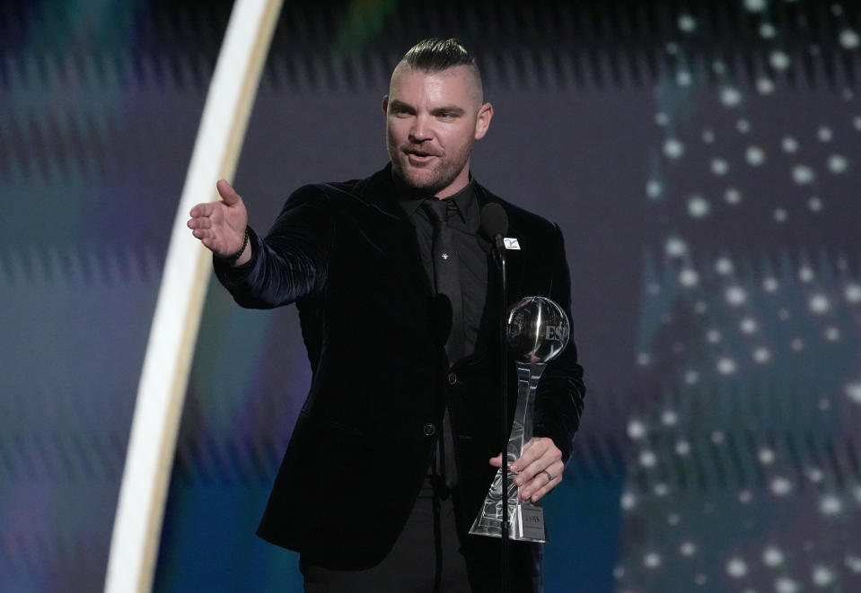 Professional MLB baseball player Liam Hendriks, of the Chicago White Sox, accepts the Jimmy V award for perseverance at the ESPY awards on Wednesday, July 12, 2023, at the Dolby Theatre in Los Angeles. (AP Photo/Mark J. Terrill)