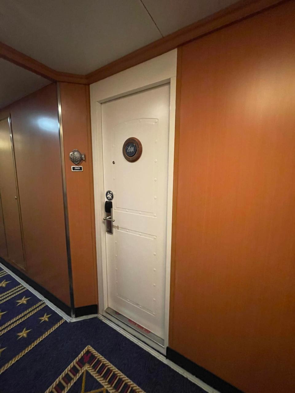 shot of the door to a deluxe inside stateroom on a disney magic cruise ship