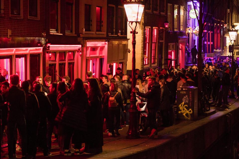 Some 115 guided tours pass through Amsterdam's infamous red-light district every day but starting in April, the windows of sex shops must be left off their itineraries.