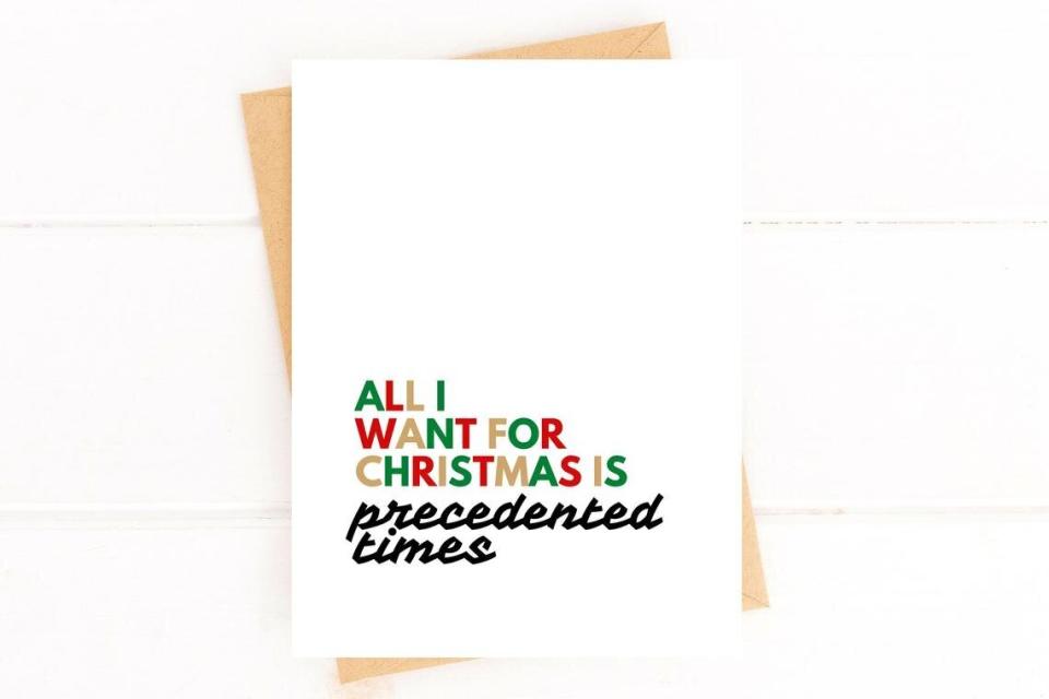 Buy it from <a href="https://www.etsy.com/listing/904383193/precedented-times-holidays-card-2020" target="_blank" rel="noopener noreferrer">FiveDotPost on Etsy</a> for $5.00