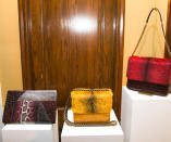 Snakeskin evening bags were shown in a variety of different shades ©Rex