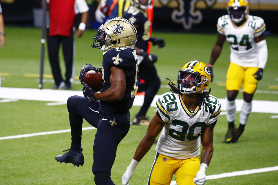 New Orleans Saints wide receiver Emmanuel Sanders (17) pulls in a touchdown reception over Green Bay Packers cornerback Kevin King (20) in the first half of an NFL football game in New Orleans, Sunday, Sept. 27, 2020. (AP Photo/Butch Dill)