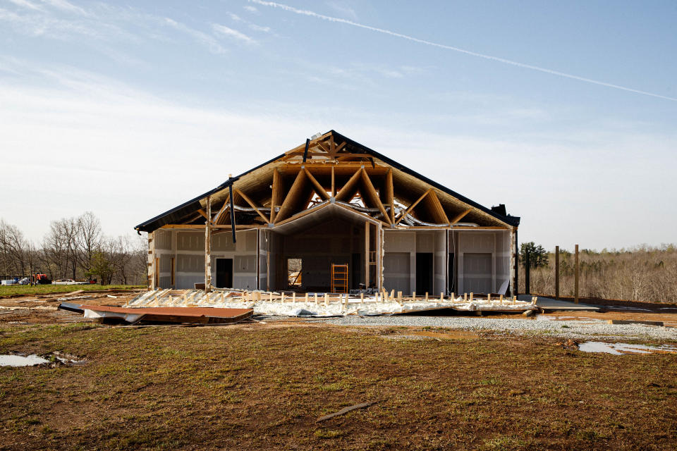 A newly constructed home sits destroyed from a tornado in Hohenwald, Tenn. on Mar. 31, 2023. The face of the home was completely ripped off