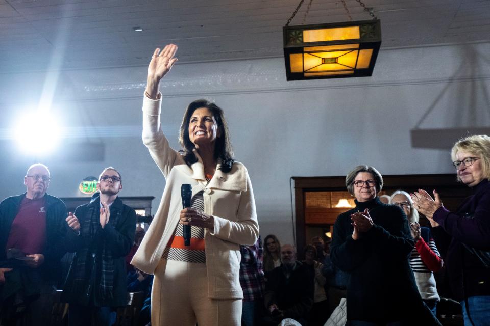 Republican presidential candidate Nikki Haley waves to supporters during a campaign stop at K & B Emporium on Saturday, Dec. 9, 2023, in Clear Lake.