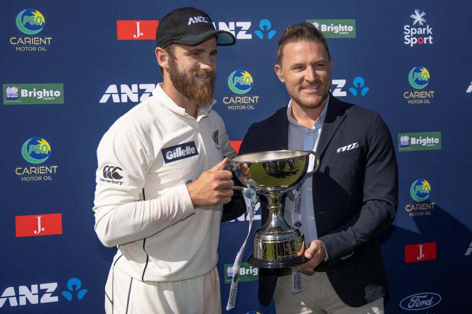 Pictured right, Brendon McCullum presents the World Test Championship trophy to Black Caps skipper Kane Williamson.