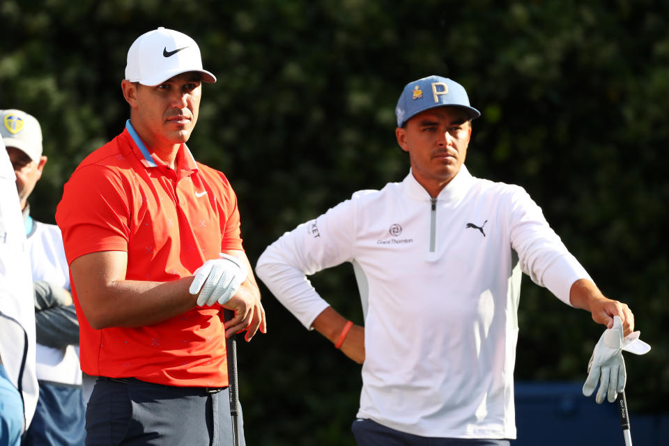 PONTE VEDRA BEACH, FLORIDA - MARCH 15:  Brooks Koepka of the United States and Rickie Fowler of the United States look on during the second round of The PLAYERS Championship on The Stadium Course at TPC Sawgrass on March 15, 2019 in Ponte Vedra Beach, Florida. (Photo by Gregory Shamus/Getty Images)