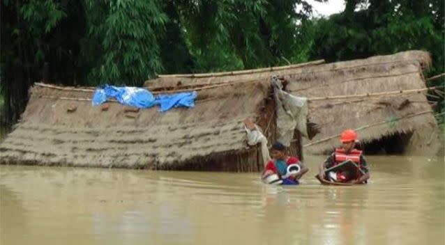 Nepalese army personnel rescue flood victims on July 26. Photo: AFP