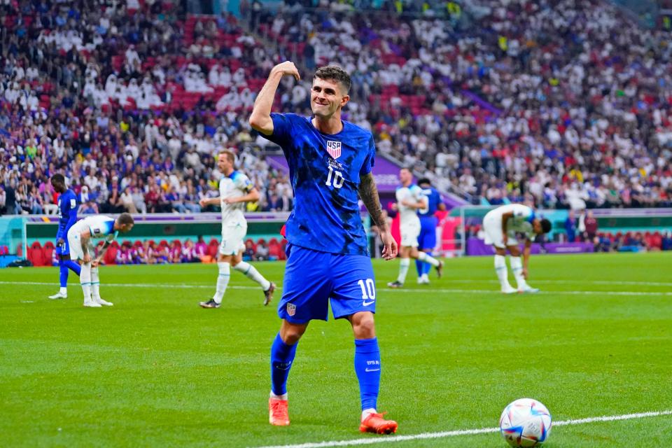 Nov 25, 2022; Al Khor, Qatar; United States of America forward Christian Pulisic (10) gestures towards fans before taking a corner kick against England during the second half of a group stage match during the 2022 World Cup at Al Bayt Stadium.