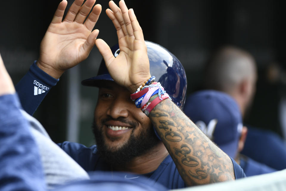 Seattle Mariners acquire outfielder Domingo Santana from the Milwaukee Brewers to continue rebuilding effort. (AP)