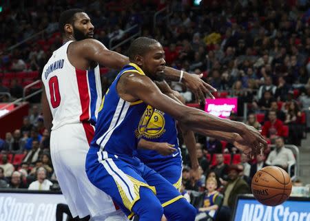 Dec 8, 2017; Detroit, MI, USA; Golden State Warriors forward Kevin Durant (35) and Detroit Pistons center Andre Drummond (0) goes for the rebound in the second half at Little Caesars Arena. Mandatory Credit: Rick Osentoski-USA TODAY Sports