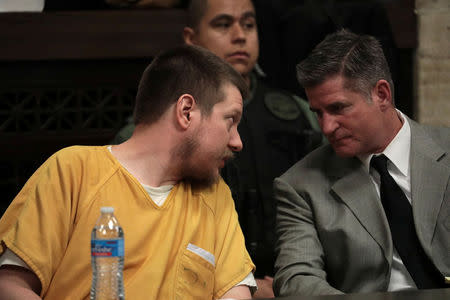 Former Chicago police Officer Jason Van Dyke speaks with his attorney Daniel Herbert during proceedings at his sentencing hearing at the Leighton Criminal Court Building in Chicago, Illinois, U.S., Janauary 18, 2019 Antonio Perez/Chicago Tribune/Pool via REUTERS