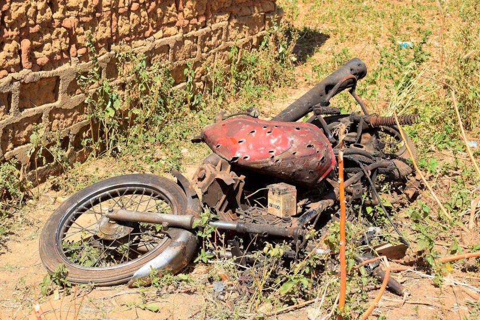 PHOTO: The remain of a motorcycle lie on the ground following an army drone attack at Tudun Biri village Nigeria, Tuesday, Dec. 5, 2023. (Kehinde Gbenga/AP)