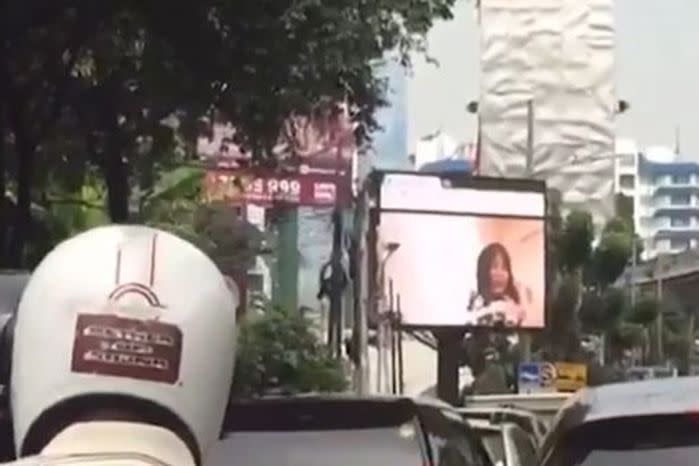 Onlookers were shocked when an advertising billboard turned into a jumbo-sized porn screening.