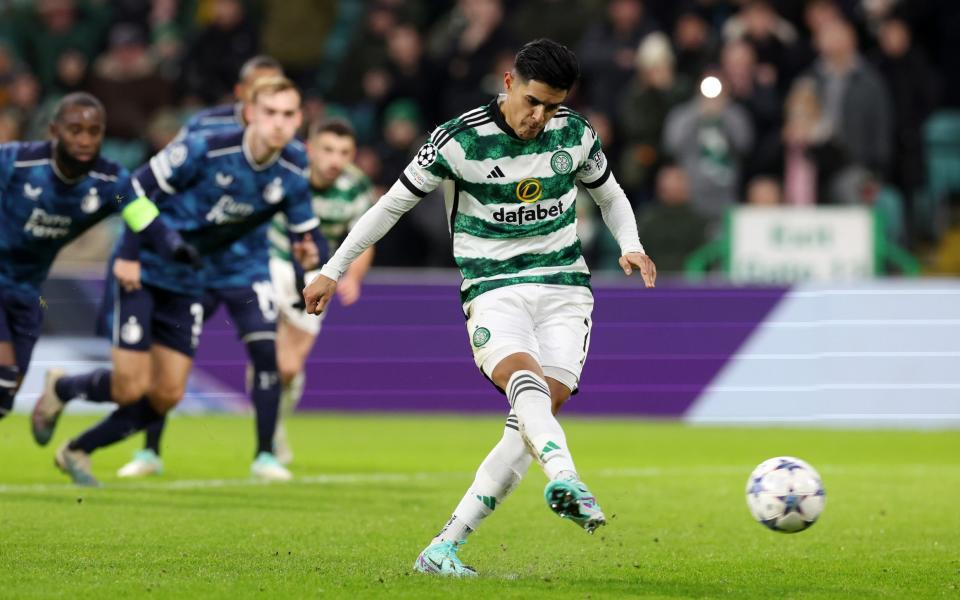 Luis Palma of Celtic scores their team's first goal from the penalty spot during the UEFA Champions League match between Celtic FC and Feyenoord at Celtic Park Stadium on December 13, 2023 in Glasgow, Scotland.