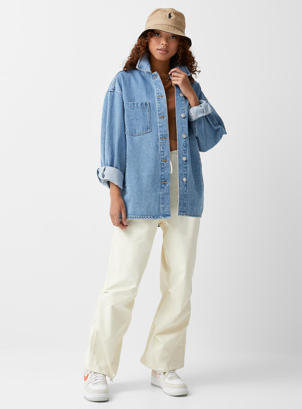 Twik Loose Eco-Friendly Denim Overshirt. Image via Simons.