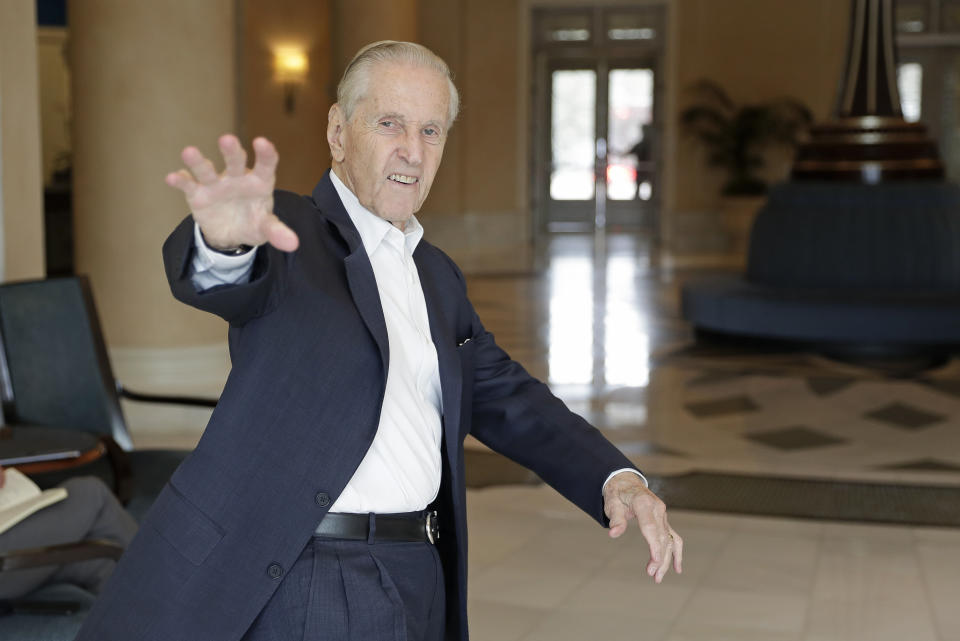 FILE - In this Feb. 5, 2020 file photo, Fred Wilpon, then principal owner of the New York Mets, waves as he heads to a meeting during MLB baseball owners meetings in Orlando, Fla. Former New York Mets owner and real estate developer Fred Wilpon alongside his wife Judy created the Kessler Scholars Program in 2008 at the University of Michigan. The program has awarded scholarships to more than 400 undergraduate students at Michigan and now the Judy and Fred Wilpon Family Foundation is gifting the program $40 million in order to fund the program in perpetuity at the university. (AP Photo/John Raoux, File)