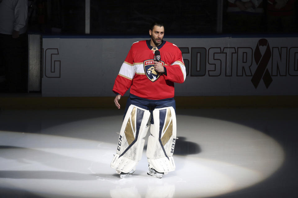 FILE - In this Thursday, Feb. 22, 2018, file photo, Florida Panthers goaltender Roberto Luongo (1) talks to fans about the shooting at Marjory Stoneman Douglas High School, prior to an NHL hockey game against the Washington Capitals, in Sunrise, Fla. The Panthers are going to send Luongo's No. 1 jersey to the rafters and make him the first player in franchise history to receive that distinction during a ceremony before a game against Montreal, Luongo's hometown team, Saturday, March 7, 2020. (AP Photo/Joel Auerbach, File)