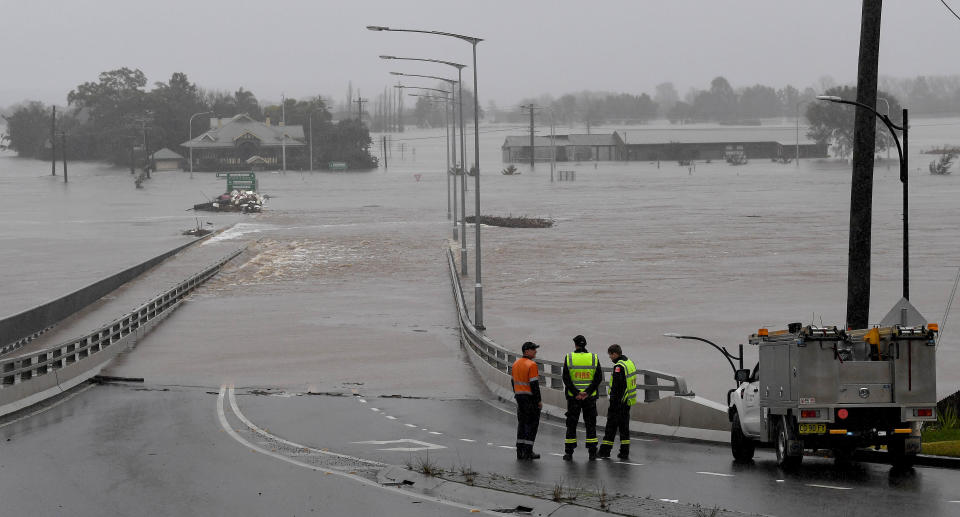 The swollen Hawksbury River in Windsor, north west of Sydney, has engulfed Windsor bridge. Source: AAP
