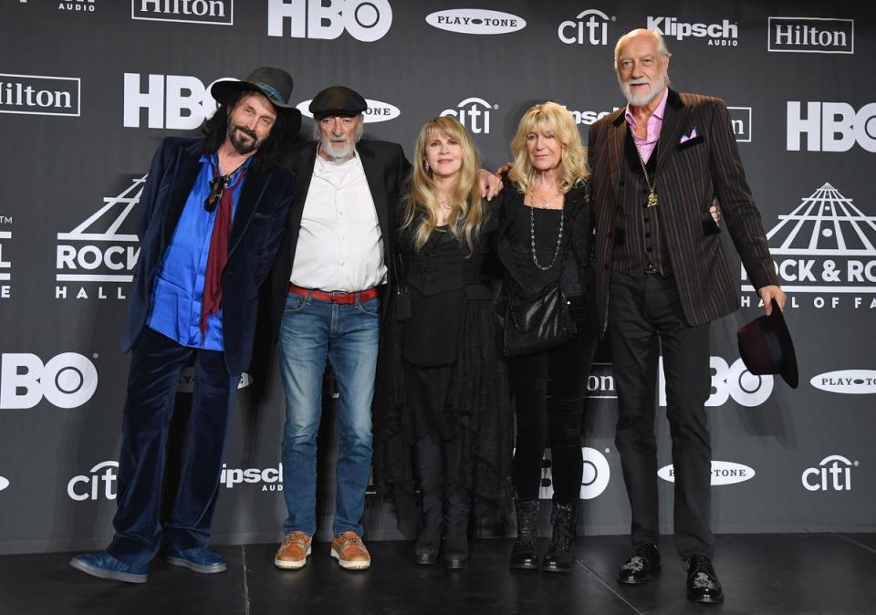 (From L) Mike Campbell, John McVie, inductee Stevie Nicks, Christine McVie and Mick Fleetwood of Fleetwood Mac at the 2019 Rock & Roll Hall Of Fame Induction Ceremony (AFP via Getty Images)