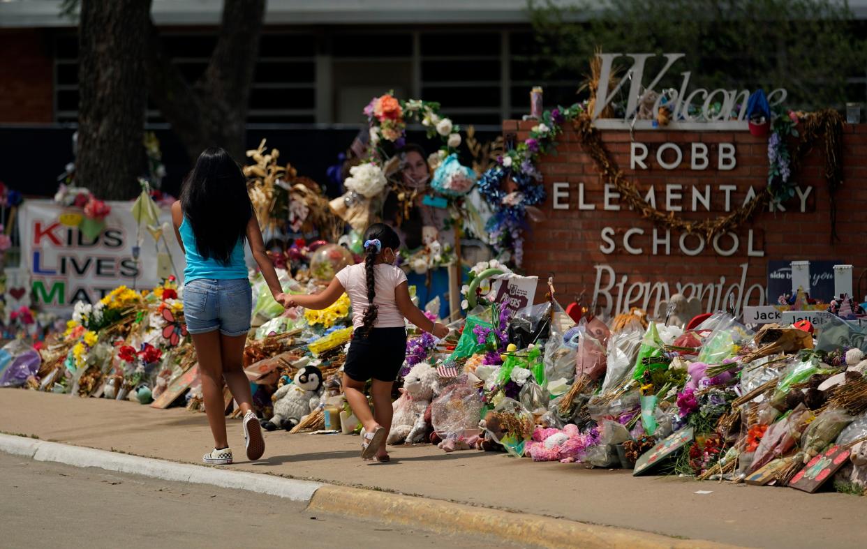 A memorial honoring the Robb Elementary School victims is pictured in July.