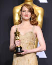 <p>Best actress winner Emma Stone gave her Planned Parenthood accessory the spotlight, pinning it at the top of her dress. (Photo: Getty Images) </p>