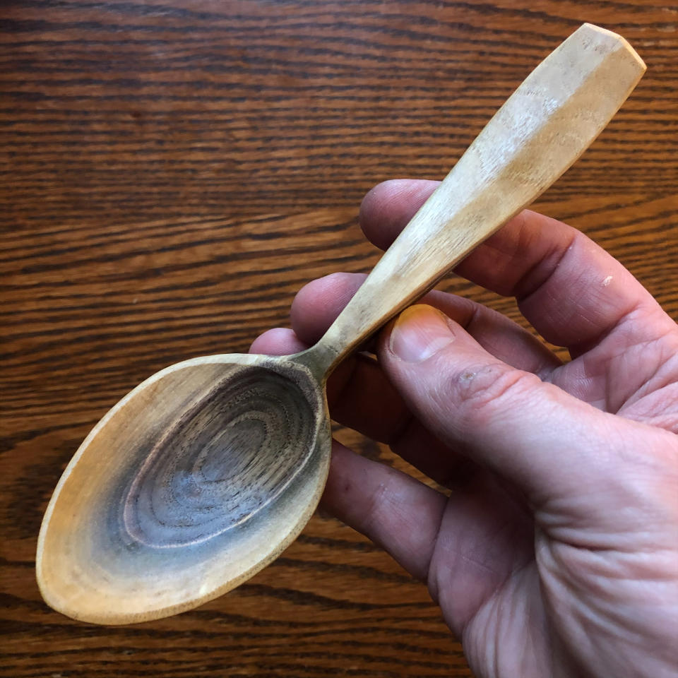 This undated photo provided by Charles Trella shows a carved wooden spoon, one of many he’s made over the years. (Charles Trella via AP)
