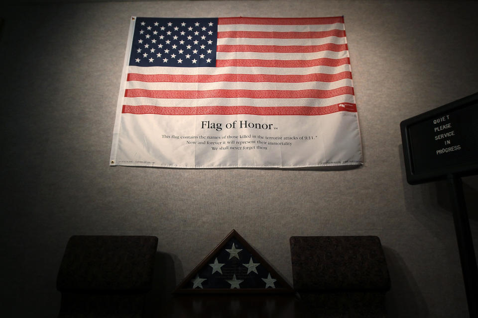 ARLINGTON, VA - JUNE 28: A flag with names of all 184 victims in the Pentagon attack hangs on a wall at the Memorial Chapel of the Pentagon June 28, 2011 in Arlington, Virginia. This year is the 10th anniversary of the September 11 terrorist attacks, in which 184 people were killed at the Pentagon. (Photo by Alex Wong/Getty Images)