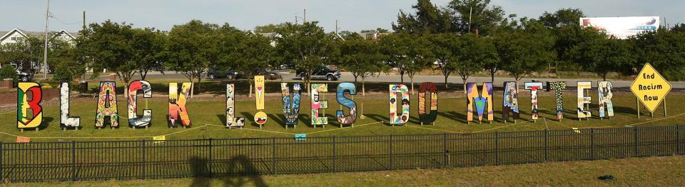 "Black Lives Do Matter" installation by Wilmington artist Greyson Davis/Haji P/HP Fangs, along North Third Street by the Isabel Holmes Bridge.