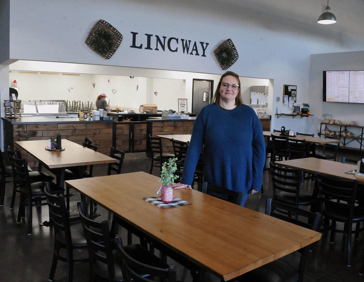 Delight Howells stands in the middle of the LincWay Cafe located in the new playlab near Dalton. It is one of the new businesses along US Route 30.