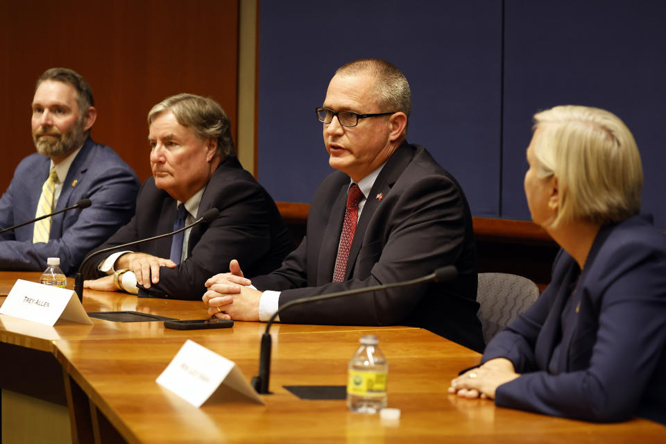 Republican state Supreme Court candidate Trey Allen, second right, speaks during the North Carolina Supreme Court Candidate Forum at Duke University Law School in Durham, N.C., Wednesday, Oct. 26, 2022. (AP Photo/Karl DeBlaker)