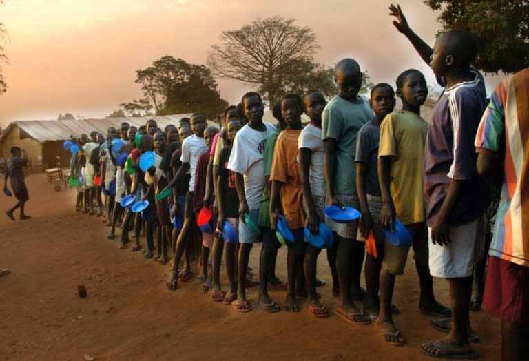 Children rescued from the Lord's Resistance Army line up for dinner at the Gusco Centre, a place for formerly abducted children in Gulu, Uganda