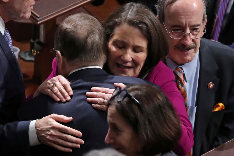 Rep. Diana Degette embraces House Judiciary Committee Chairman Jerrold Nadler after voting on Trump impeachment in Washington