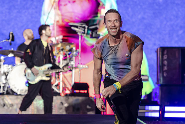 Coldplay's Chris Martin (left) and Will Champion arrive for the